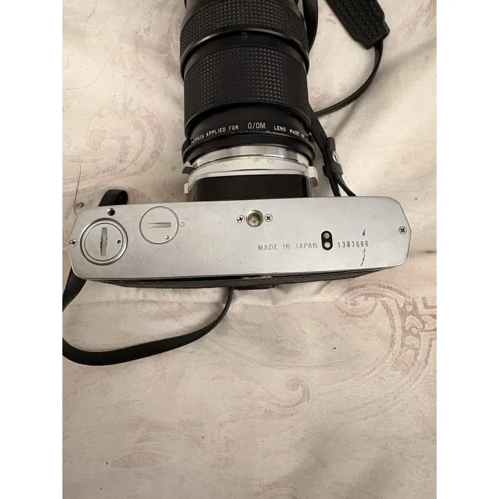 Olympus OM-1 Film Camera W/ Vivitar 75-205mm F3.8 Auto Focus Lens And Arm Sling